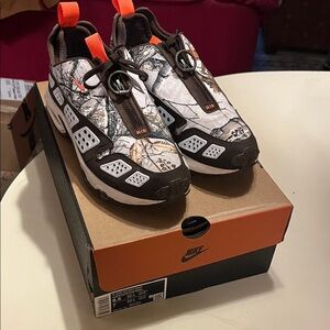 Nike Air Max SNDR Women’s Realtree Camouflage with Orange Accents